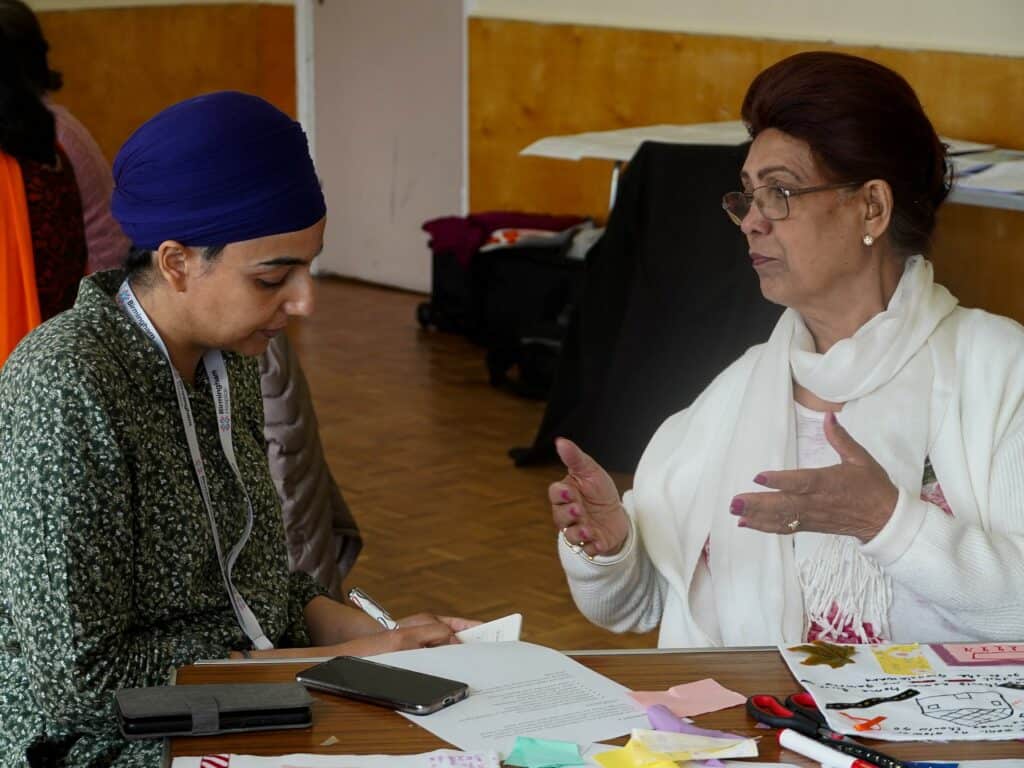 Two ladies in conversation