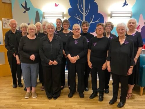 The members of Birmingham Hospice Singers choral group.
