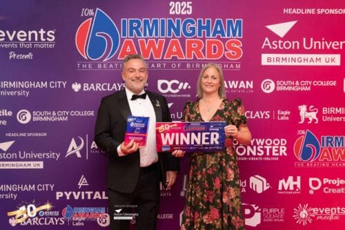 Paul Bytheway, Chief Executive, and Lucy Watkins, Income Generation Director, with the award.